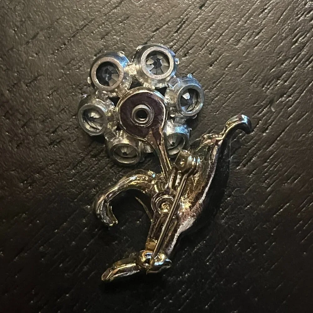 Vintage Flower Brooch with Aurora Borealis AB Blue Stones